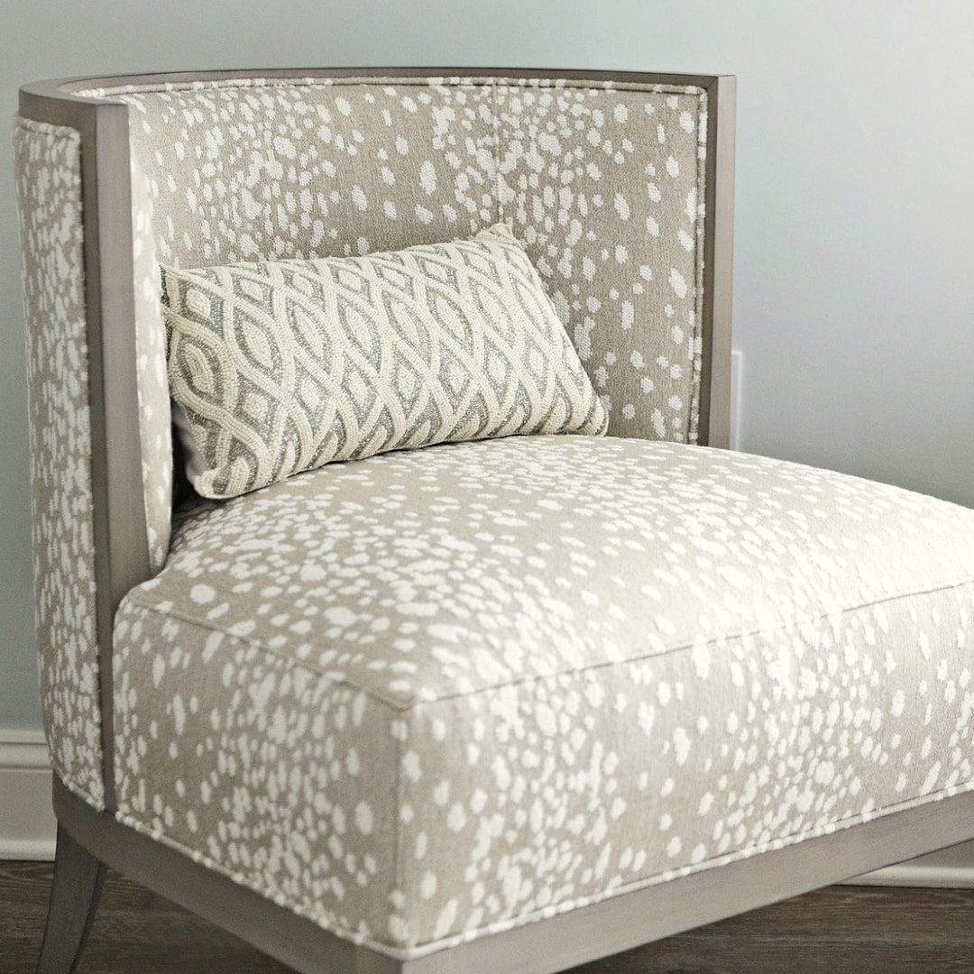 Upholstered accent chair in a soft patterned fabric