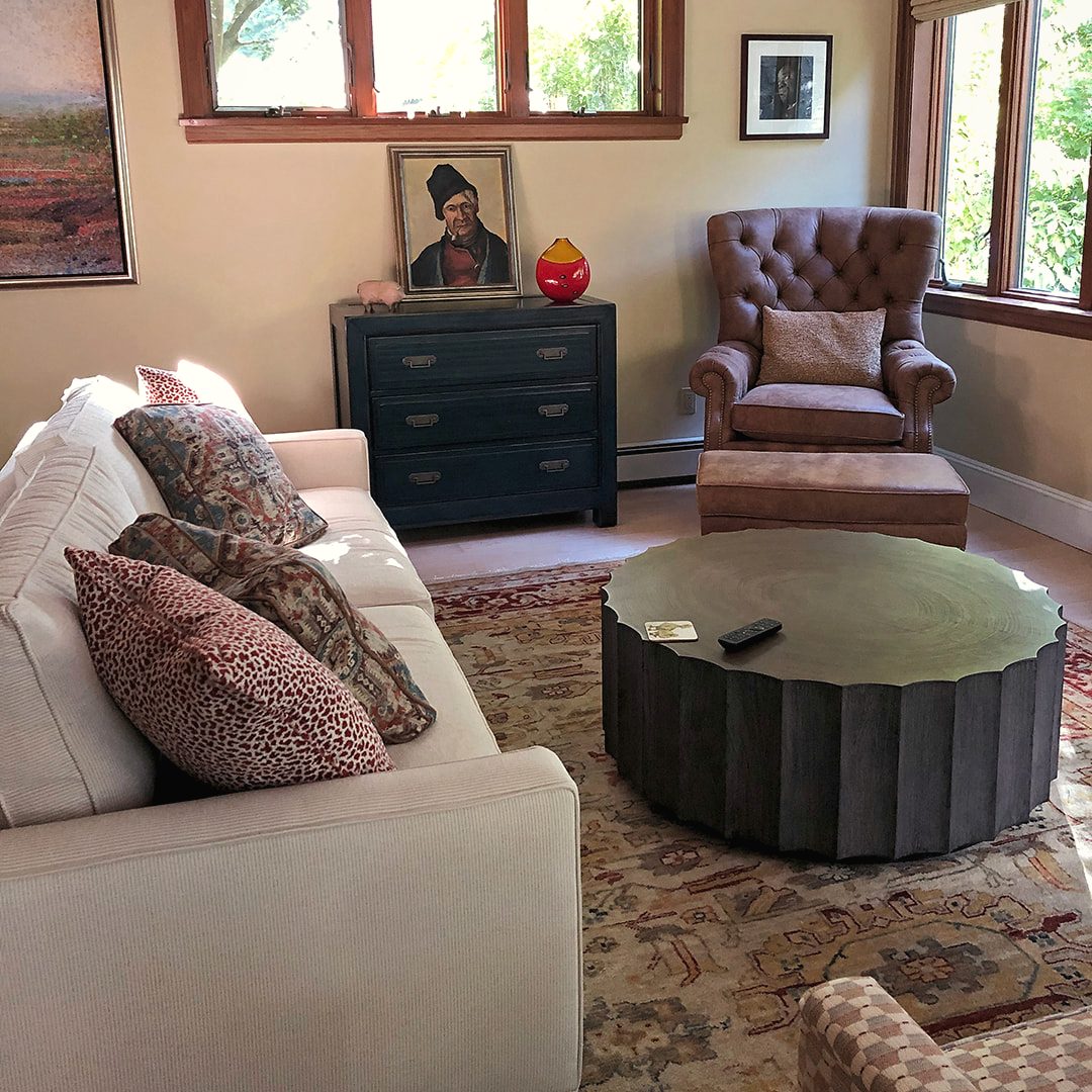 A styled, sale-ready living room with a neutral palette by JK Home Design